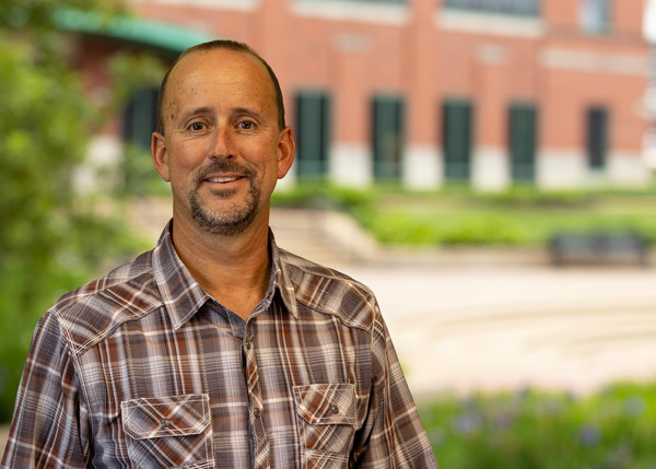 Brent Cain, Project Manager in the Water group at Horner & Shifrin, with a soft smile in a professional headshot outside of Horner & Shifrin HQ.