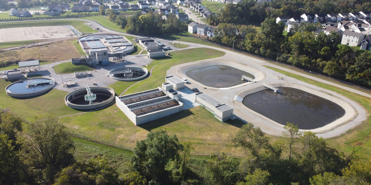 Aerial view of the Saline Creek Regional Wastewater Treatment Facility in Fenton, MO, showcasing its upgraded treatment basins and buildings.